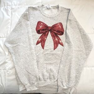 Gray Sweatshirt with Red Bow Design. Size L. NWOT